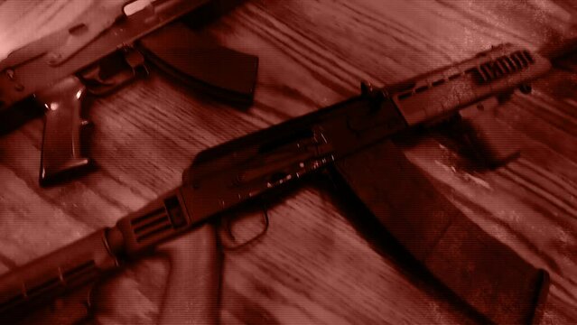 Assault rifles in red grunge elements non looping