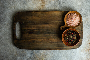 Cooking concept with spices on concrete background