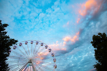 ferries wheel and sunset sky