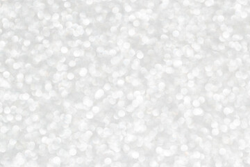Abstract background with silver blurred small circles.