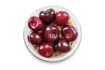Cherry Greek yogurt granola parfait in a glass on a white isolated background
