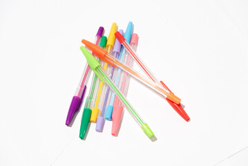 pens of various colors placed in an artistic way