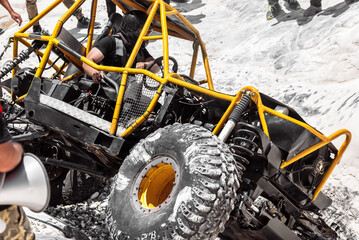 Close-up of off-road 4x4 stunt buggy car during competition