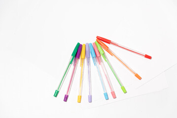 pens of various colors placed in an artistic way