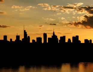 Big city skyline of Warsaw, Poland. Silhouettes Of modern skyscrapers and the famous Palace of...