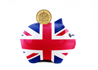 Piggy Bank With UK Flag and Coin Deposit Concept of Inflation and Savings