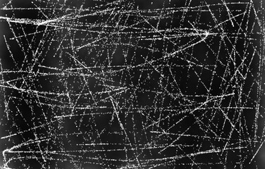 Grunge black and white pattern. Monochrome particles abstract texture. Background of cracks, scuffs, chips, stains, ink spots, lines. Dark design background surface.

