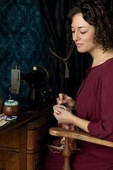 A 1920s seamstress working at her sewing machine