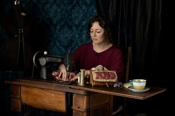 A 1920s seamstress working at her sewing machine