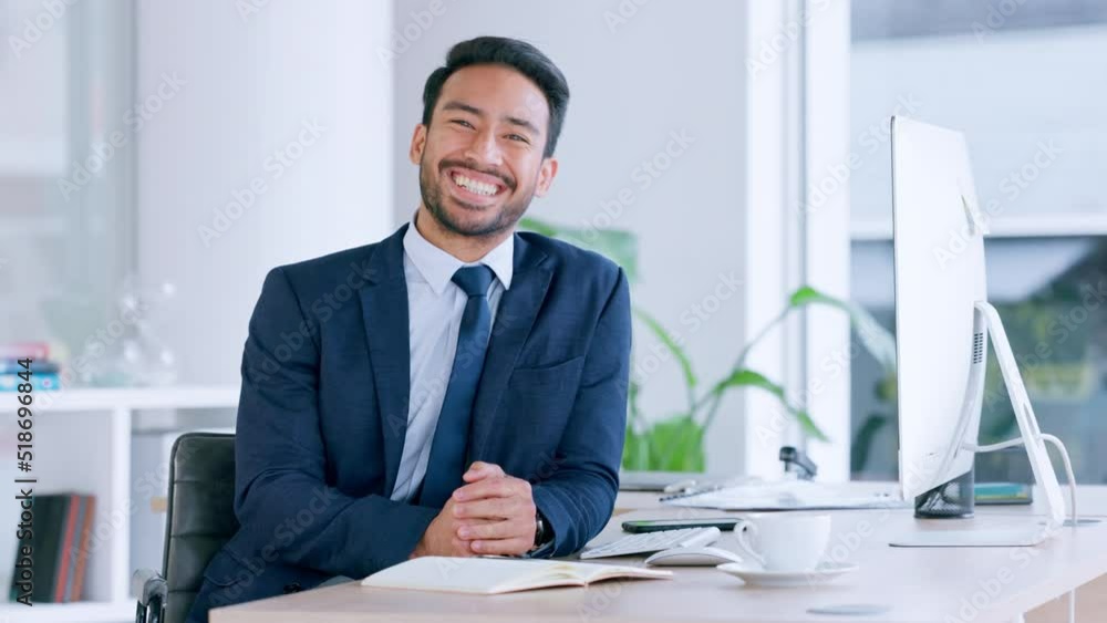 Poster Business man typing and browsing on a computer while working in an office. Portrait of one ambitious and confident young entrepreneur smiling while doing research and planning online in a company