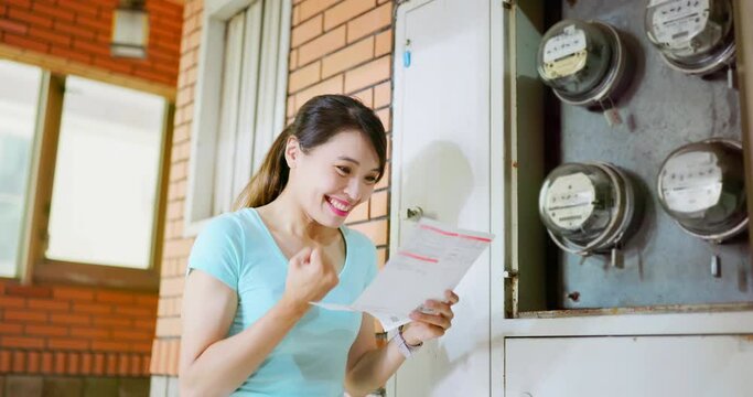 woman and electricity bill