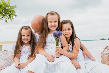 Family rest, children smile very sincerely.