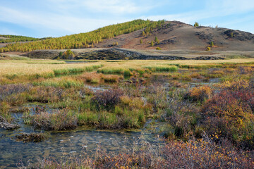 Altai ice covered lake Dzhangyskol on mountain plateau Eshtykel. North Chui ridge. Russia.