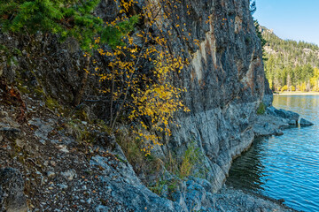 Rocky cliffs abut Crown Lake at Marble Canyon Provincial Park in British Columbia, Canada