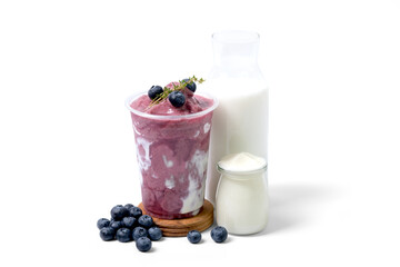 Blueberry yogurt smoothie with Blueberry fruit,yogurt bottle and milk bottle isolated on white background. coffee shop cafe menu concept.