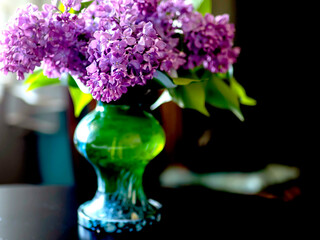 bright bouquet of lilacs in a vase