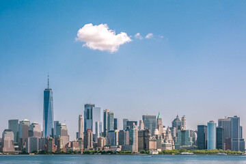 The view of New York cityscape with only cloud across the Hudson river	
