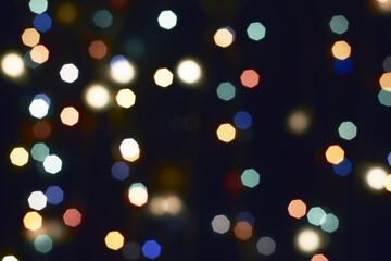 multicolored festive lights on a black background screensaver backdrop