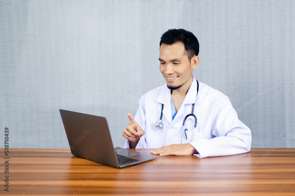 Poster doctor use computer connection server data base patient for technology treatment in hospital