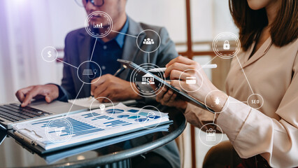 Business team partnership meeting concept. Business hand using laptop, tablet and smartphone  in office. Digital marketing media mobile app in virtual icon screen