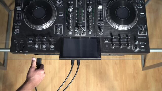 Disconnecting XLR and power cable to DJ mixer (Aerial)