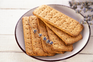 Traditional galette for breakfast, low-calorie for a healthy diet. On white wooden background, top view