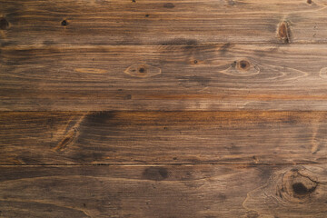 Dark old brown wooden desk table texture surface. Can be used as space for your text or image. top view and copy space.