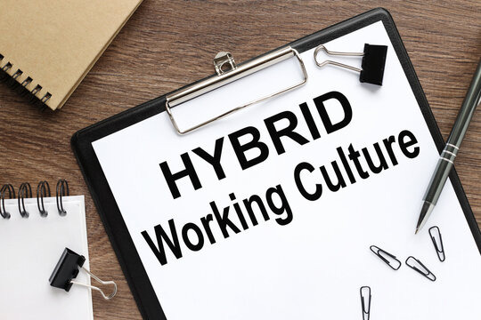 Hybrid working culture symbol. Concept words hybrid working culture . Beautiful wooden background. Business and hybrid working culture concept, copy space.