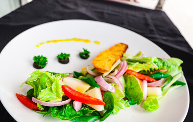 fresh green vegetable  salad with lemon sauces