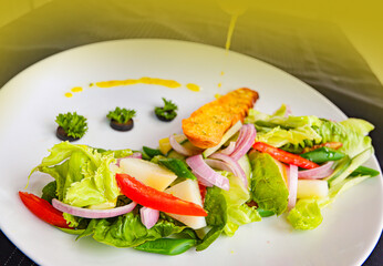 fresh green vegetable  salad with lemon sauces