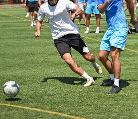 Soccer players in action outdoor match