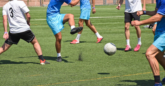 Soccer players in action outdoor match