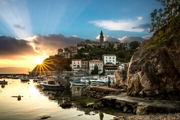 Skyline of the town of Vrbnik on the island of Krk, Croatia. Harbor and mountain village at...