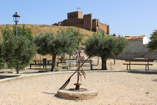 TRASMOZ, ESPA&Ntilde;A - 17 DE JULIO de 2022: Sculpture in Trasmoz in homage to the witches with the castle in the background. This town in Zaragoza is famous for witchcraft