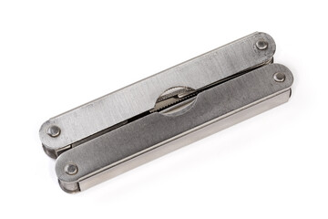 Folded multi-tool on a white background