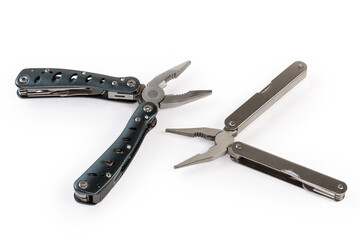 Two different multi-tools with open pliers on white background