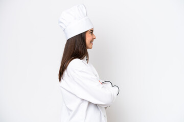 Young Brazilian chef woman isolated on white background in lateral position