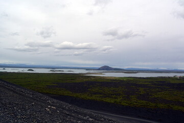 Black cone-shaped crater of the extinct volcano Nverfjall in Iceland