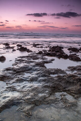 After sunset on the rocky beach palmachim Israel