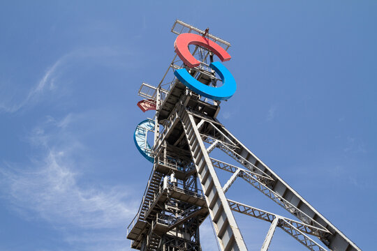 Silesia City Center shopping mall, located on the site of former coal mine KWK Gottwald. SCC logo sign at antique tower shaft Jerzy on July 21, 2022 in Katowice, Poland.