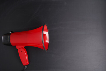 red megaphone on the chalkboard