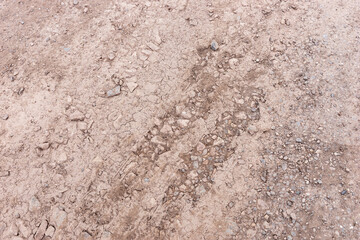 Empty countryside gravel road. Closeup