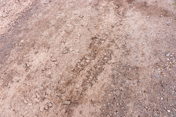 Empty countryside gravel road. Closeup
