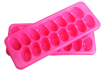 Plastic pink mold for ice. Refrigeration of drinks.
