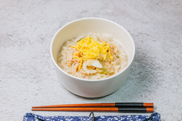 This dish consists of buckwheat noodles served in chilled chicken soup flavored with vinegar and mustard and topped with shredded chicken. Chogyeguksu is a dish commonly eaten in summer as it is belie