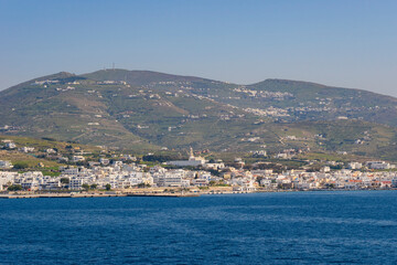 Beautiful view of the island of Tinos from the deck of a ferry boat in Sporades, Greece