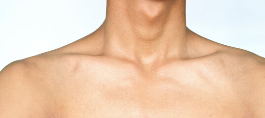 male adam's apple with white in background.
