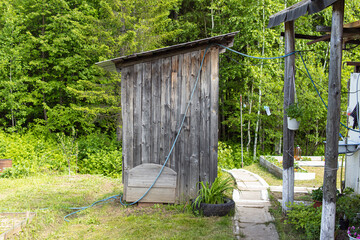 Country wooden toilet. Natural. Outdoor toilet