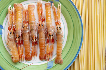 flat lay of spaghetti with scampi