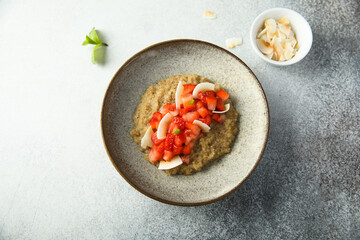 Healthy quinoa porridge with fresh strawberry